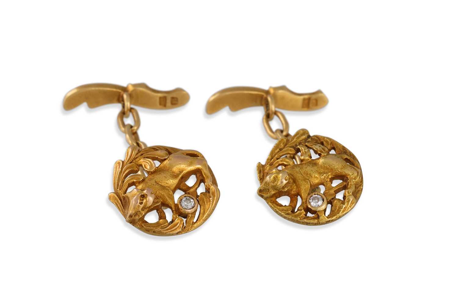 Lot 153 - A PAIR OF VINTAGE GOLD CUFFLINKS, with lion...