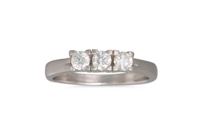 Lot 150 - A THREE STONE DIAMOND RING, in 18ct white gold....