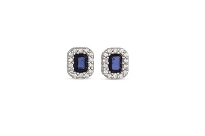 Lot 218 - A PAIR OF DIAMOND AND SAPPHIRE CLUSTER...
