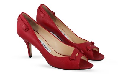 Lot 221 - A PAIR OF RED LEATHER JIMMY CHOO HEELS, boxed,...