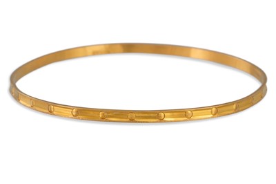 Lot 340 - A HIGH CARAT YELLOW GOLD BANGLE, stamped 875,...