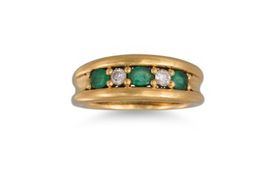 Lot 12 - AN EMERALD AND DIAMOND RING, mounted in yellow...