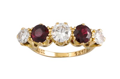 Lot 379 - A RUBY AND DIAMOND FIVE STONE RING, mounted in...