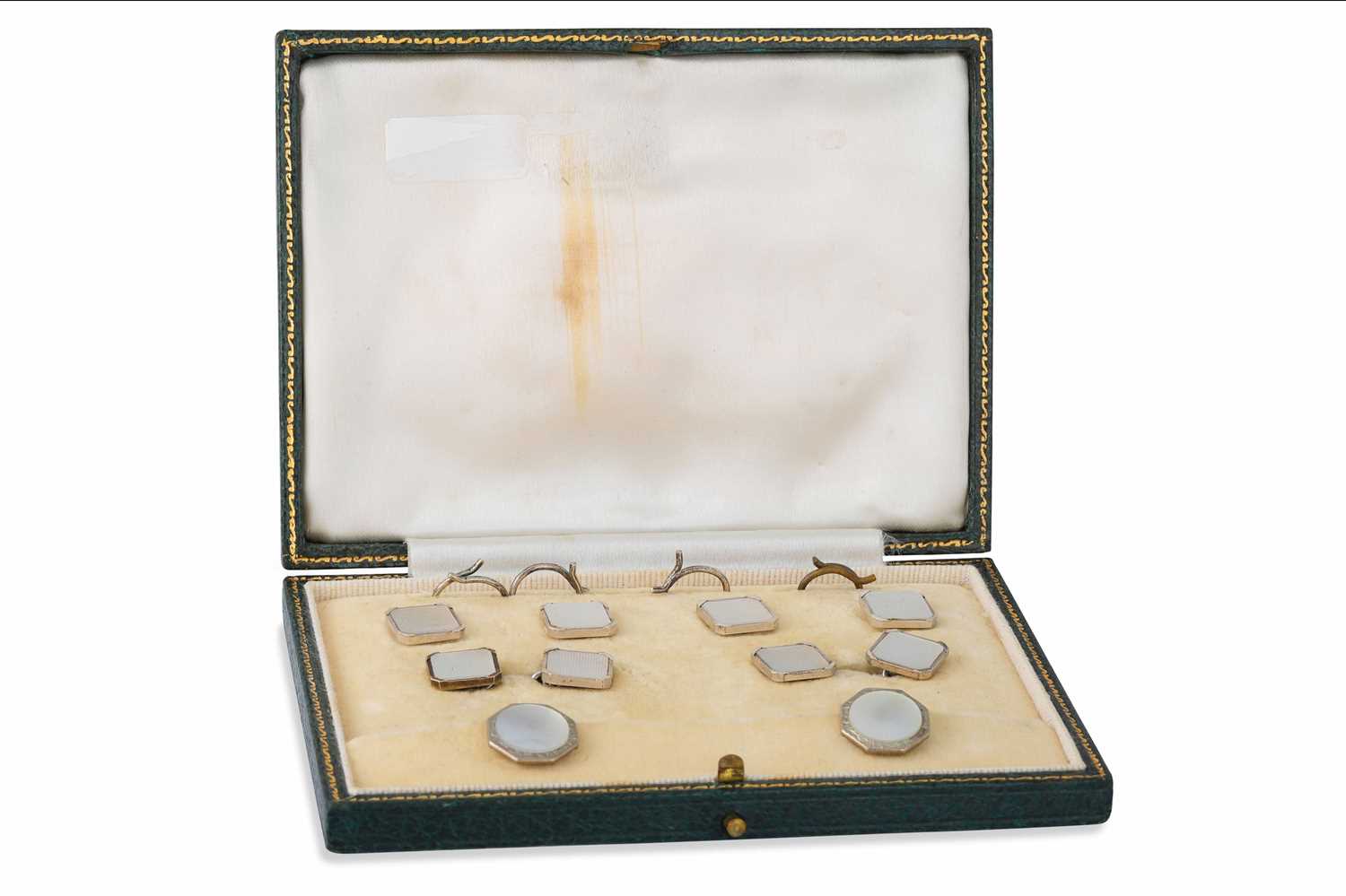 Lot 82 - A 1920'S WHITE GOLD STUD SET, mother of pearl...