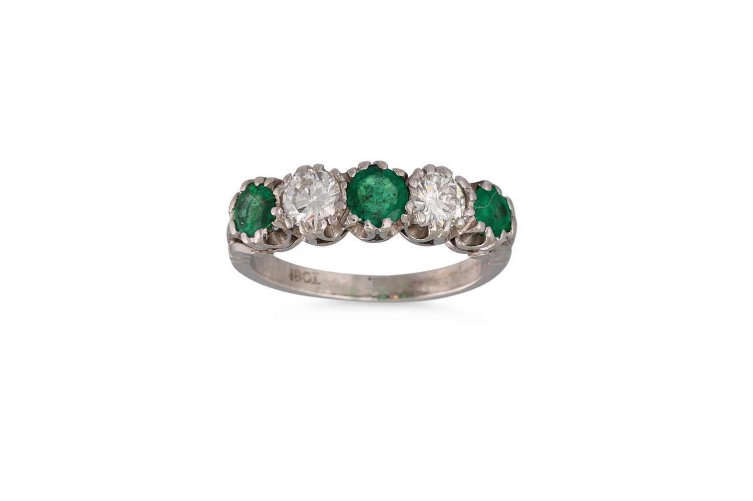 Lot 87 - A DIAMOND AND EMERALD FIVE STONE RING, the...