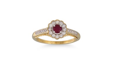 Lot 97 - A DIAMOND AND RUBY CLUSTER RING, the circular...