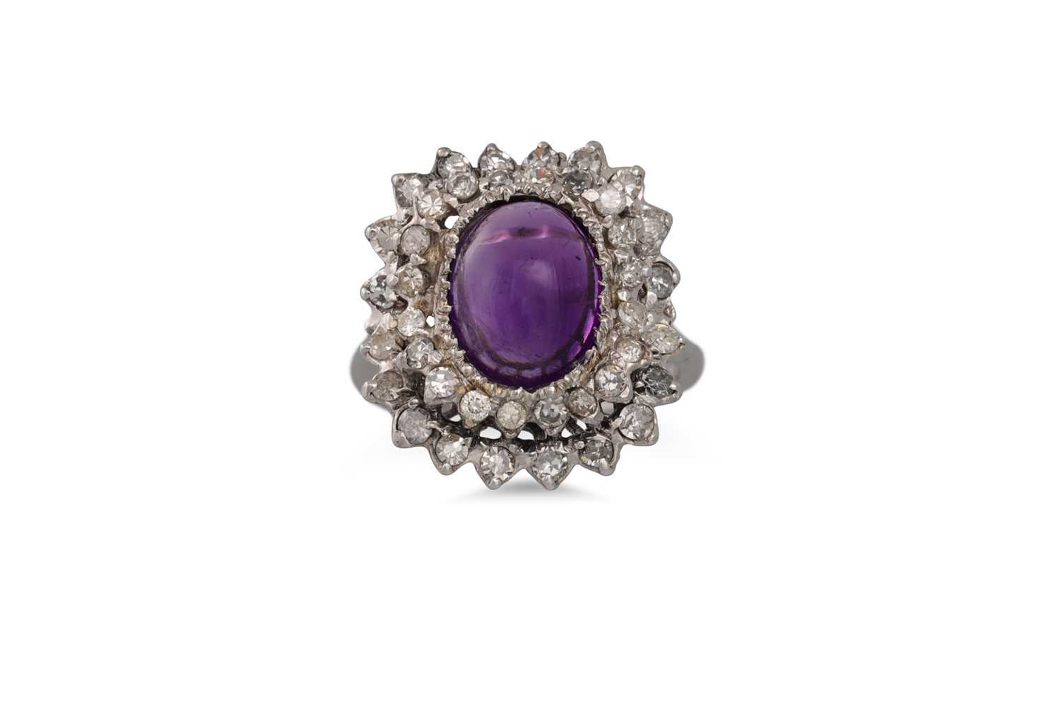 Lot 98 - A DIAMOND AND AMETHYST CLUSTER RING, the...