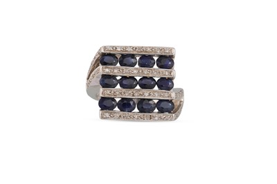 Lot 105 - A DIAMOND AND SAPPHIRE CLUSTER RING, of square...