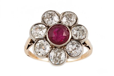 Lot 271 - A RUBY AND DIAMOND CLUSTER RING, the circular...