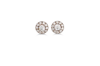 Lot 401 - A PAIR OF DIAMOND CLUSTER EARRINGS, mounted in...