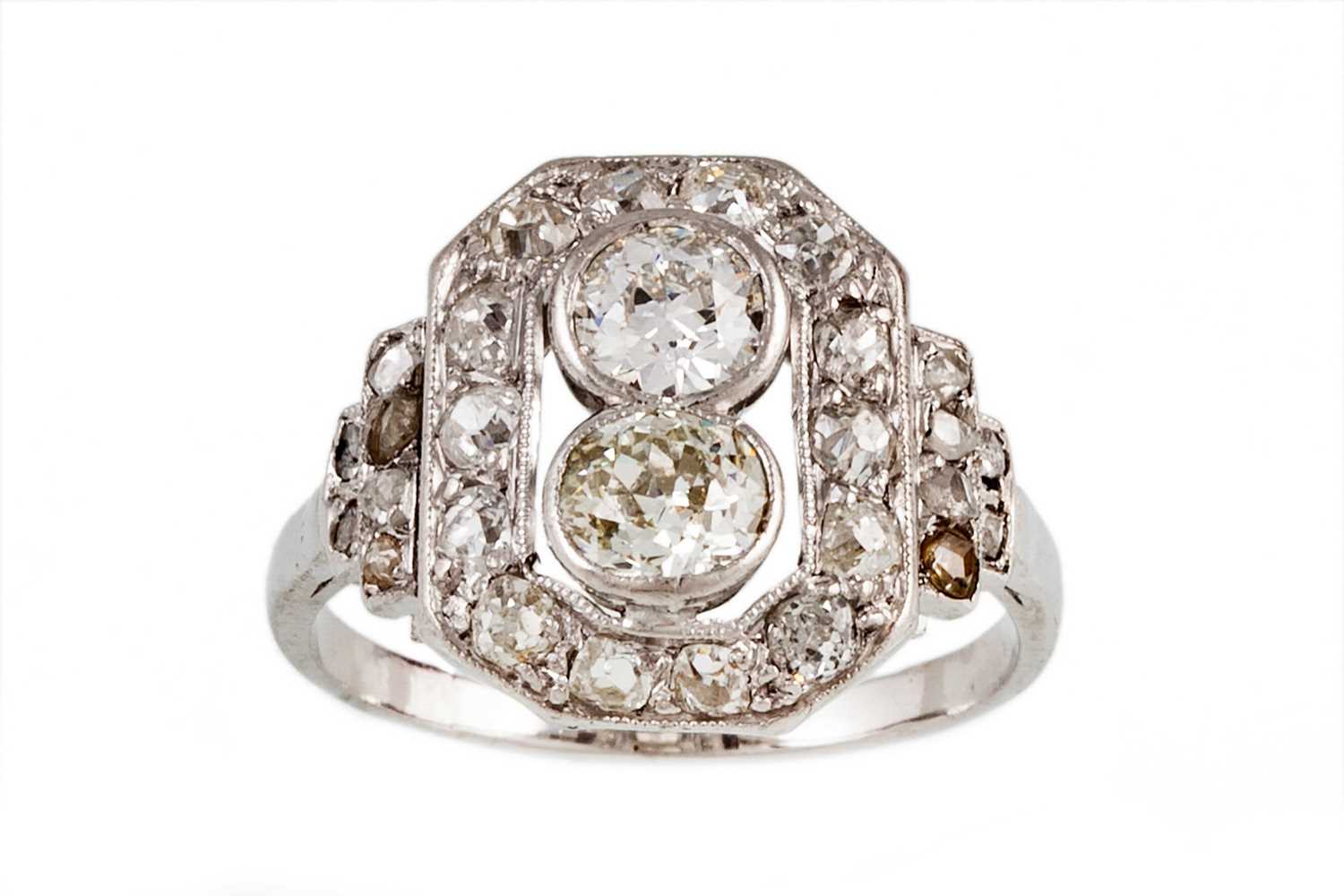 Lot 111 - A DIAMOND CLUSTER RING, in the Art Deco style,...