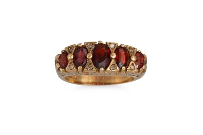 Lot 435 - A GARNET AND DIAMOND RING, mounted in 9ct gold,...