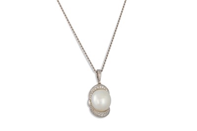 Lot 262 - A PEARL AND DIAMOND PENDANT, the large south...