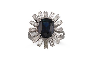 Lot 269 - A SAPPHIRE AND DIAMOND RING, the oval sapphire...