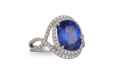 Lot 268 - A SAPPHIRE AND DIAMOND CLUSTER RING, the oval...