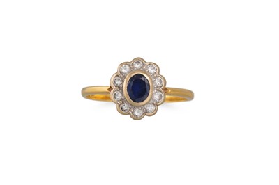 Lot 278 - A SAPPHIRE AND DIAMOND CLUSTER RING, of oval...