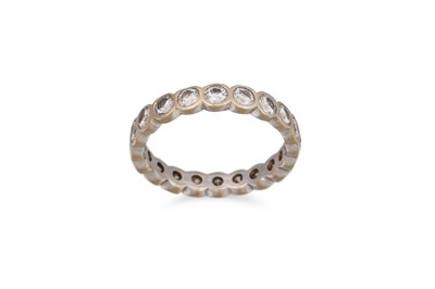 Lot 417 - A DIAMOND ETERNITY RING, the brilliant cut...