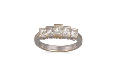 Lot 246 - A FIVE STONE DIAMOND RING, the princess cut...