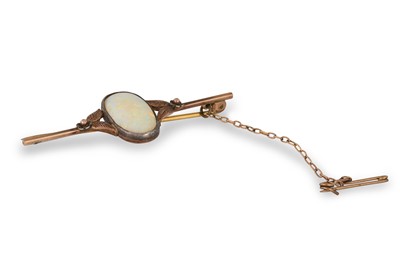 Lot 247 - AN OPAL BROOCH, mounted in gold & gold plate