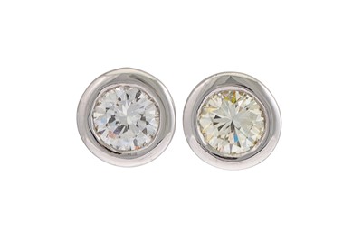 Lot 227 - A PAIR OF DIAMOND STUD EARRINGS, the collet...