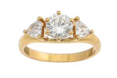 Lot 398 - A THREE STONE DIAMOND RING, the centre round...