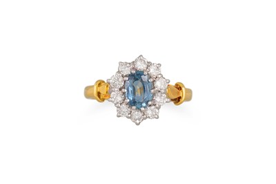 Lot 355 - A DIAMOND AND ZIRCON CLUSTER RING, mounted in...