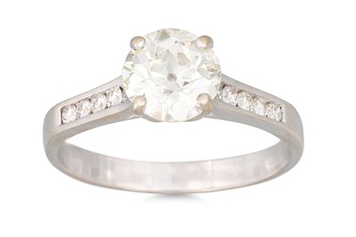Lot 325 - A DIAMOND SOLITAIRE RING, the old cut European...