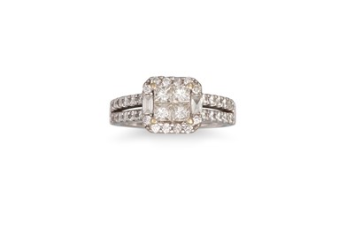 Lot 231 - A DIAMOND CLUSTER RING, set with princess cut...