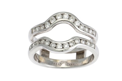 Lot 377 - A DIAMOND SET SHAPED BAND, comprising two...