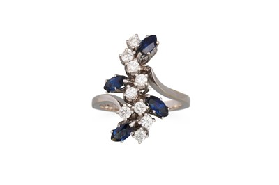 Lot 223 - A DIAMOND AND SAPPHIRE CLUSTER RING, of...