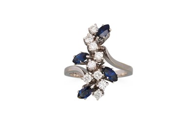 Lot 128 - A DIAMOND AND SAPPHIRE CLUSTER RING, of...