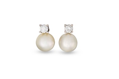 Lot 224 - A PAIR OF PEARL AND DIAMOND EARRINGS, mounted...