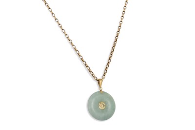 Lot 183 - A JADE PENDANT, with a Chinese motif on a 9ct...