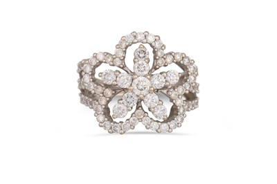 Lot 259 - A DIAMOND CLUSTER DRESS RING, mounted in 18ct...