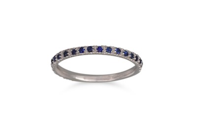 Lot 140 - A SAPPHIRE HALF ETERNITY RING, mounted in 18ct...