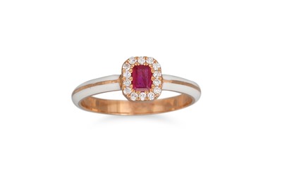 Lot 147 - A DIAMOND AND RUBY CLUSTER RING, white enamel...