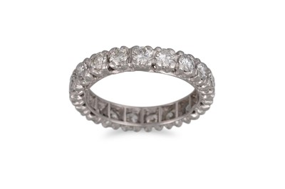 Lot 371 - A DIAMOND ETERNITY RING, the brilliant cut...