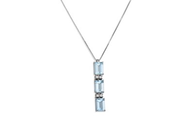 Lot 336 - A AQUAMARINE AND DIAMOND PENDANT, set with...