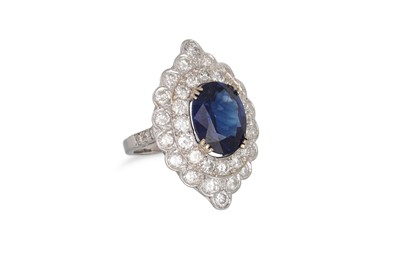 Lot 209 - A SAPPHIRE AND DIAMOND CLUSTER RING, the oval...
