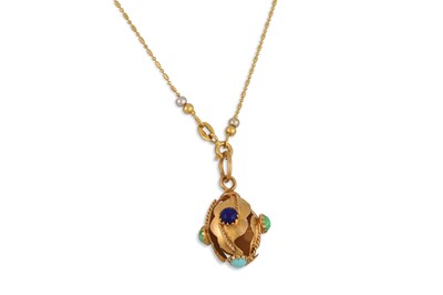 Lot 143 - A STONE SET PENDANT, turquoise and lapis, on a...