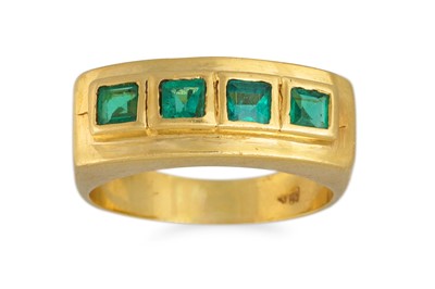 Lot 71 - AN EMERALD FOUR STONE RING, mounted in 18ct...