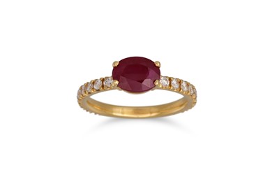 Lot 163 - A RUBY RING, the oval ruby to diamond...