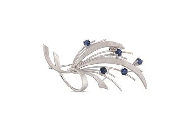 Lot 383 - A VINTAGE SAPPHIRE SET SPRAY BROOCH, textured...