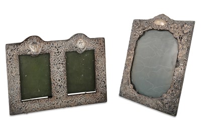 Lot 528 - TWO EDWARDIAN SILVER EMBOSSED PHOTO FRAMES