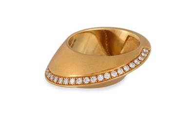 Lot 318 - A CONTEMPORARY 18CT BRUSHED GOLD RING, diamond...