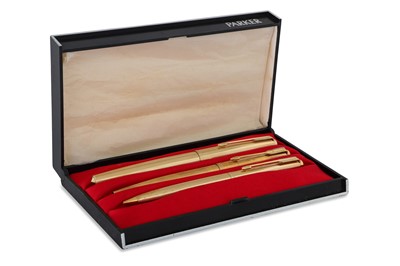 Lot 488 - A MODERN GOLD PLATED “PARKER” THREE-PIECE...