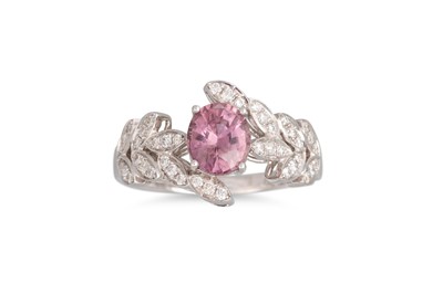 Lot 203 - A PADPARADSCHA SAPPHIRE AND DIAMOND RING, of...