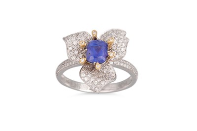 Lot 204 - A SAPPHIRE AND DIAMOND FLORAL CLUSTER RING,...