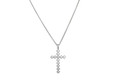 Lot 363 - A DIAMOND SET CROSS, the brilliant cut...