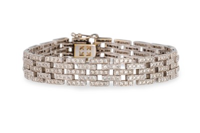 Lot 364 - A DIAMOND BRACELET, of brick link form, in...